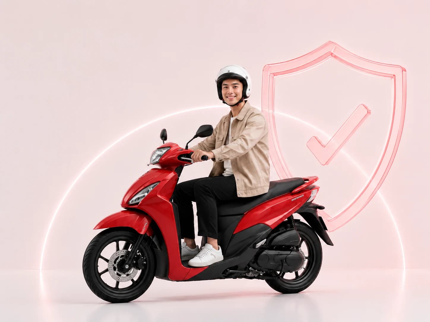 Người lái xe máy và lá chắn bảo hiểm Bảo Minh